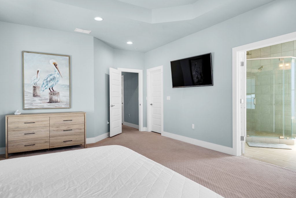 Master bedroom with flat screen TV
