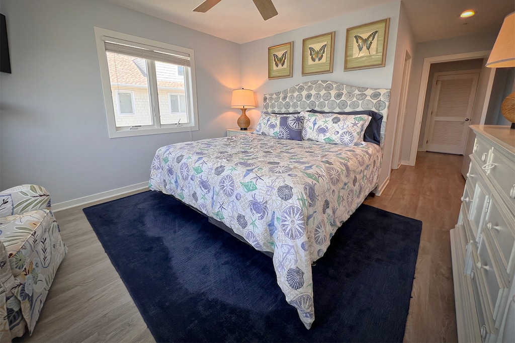 master bedroom with a king bed