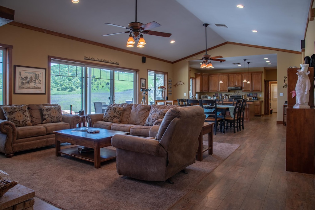 The great room (living room, dining and large kitchen) boasting forever views.