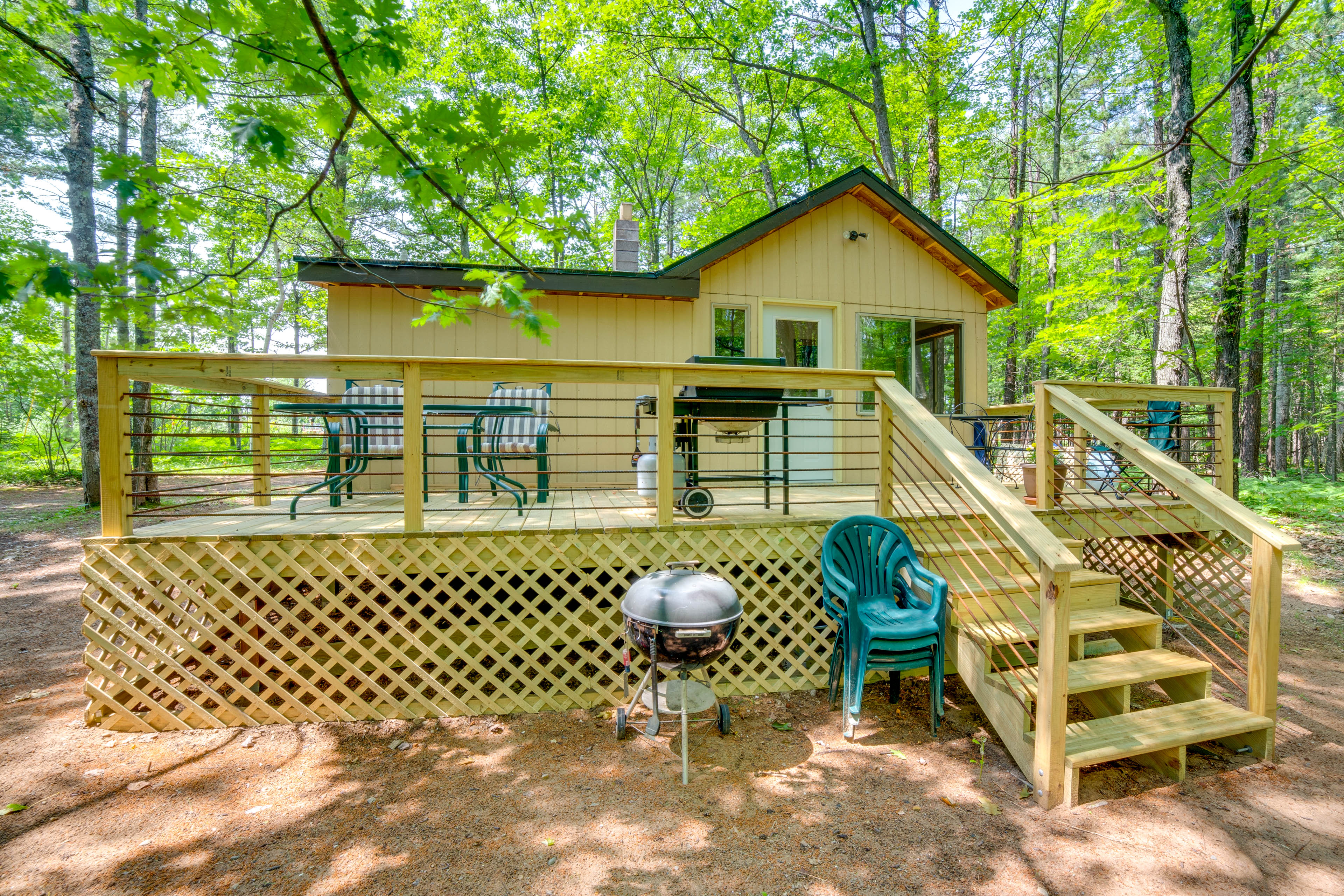 Property Image 1 - Sunroom, Deck & Grills: Marquette Cottage!