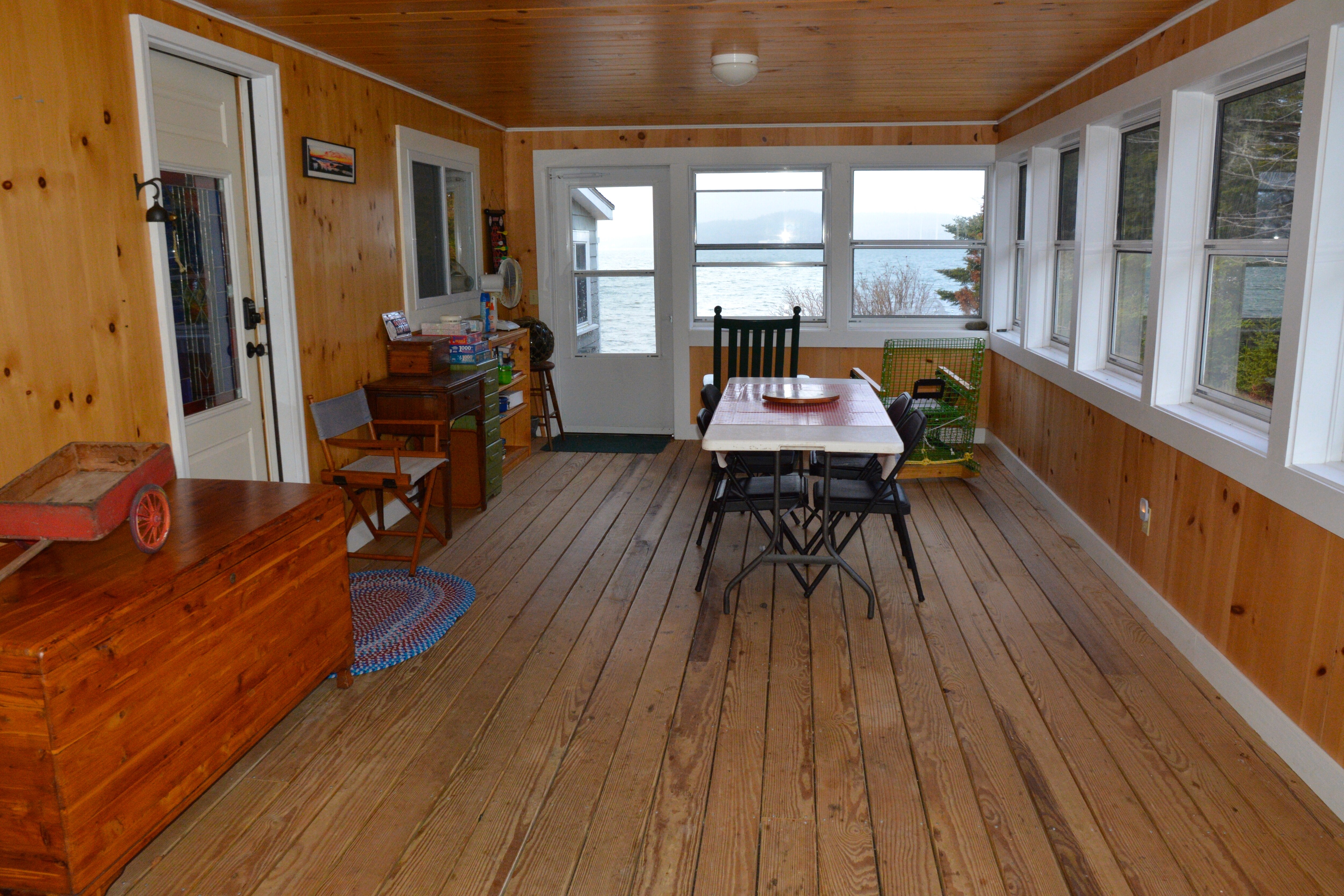 An enclosed porch.  Perfect for your lobster feast!