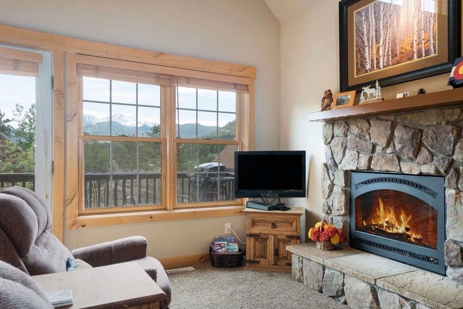 Solitude Eagle 3 - Living room with fireplace, flat screen TV, and 2 recliners.