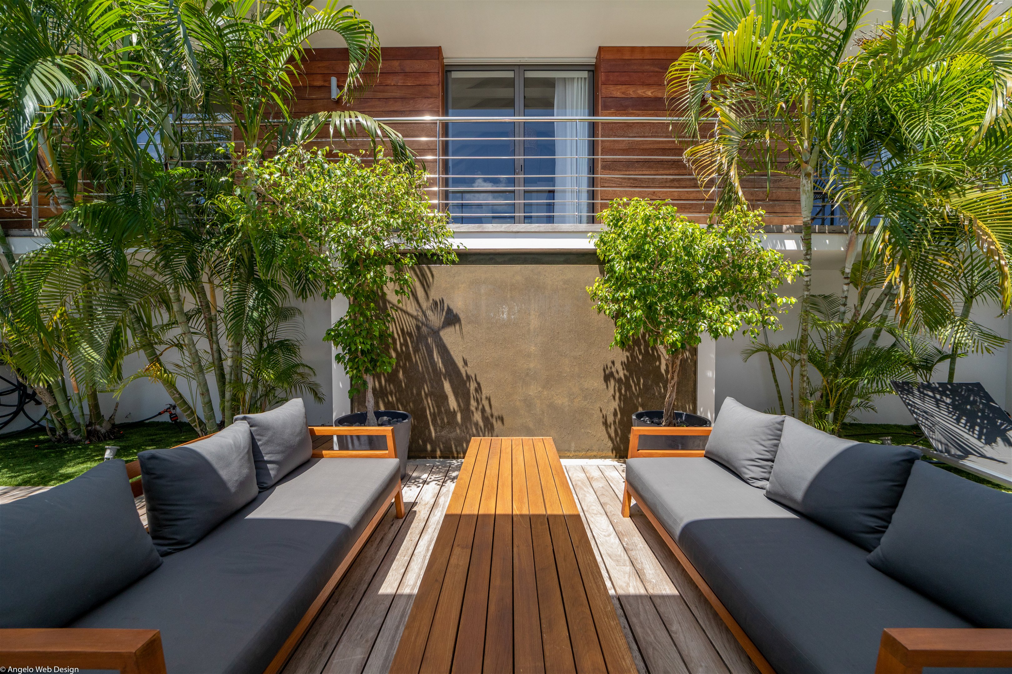 Lounge area on the back of the main building and connected to the bedrooms' building. 