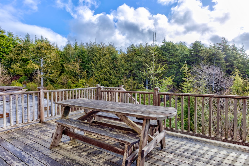 Back deck off the kitchen with outdoor seating