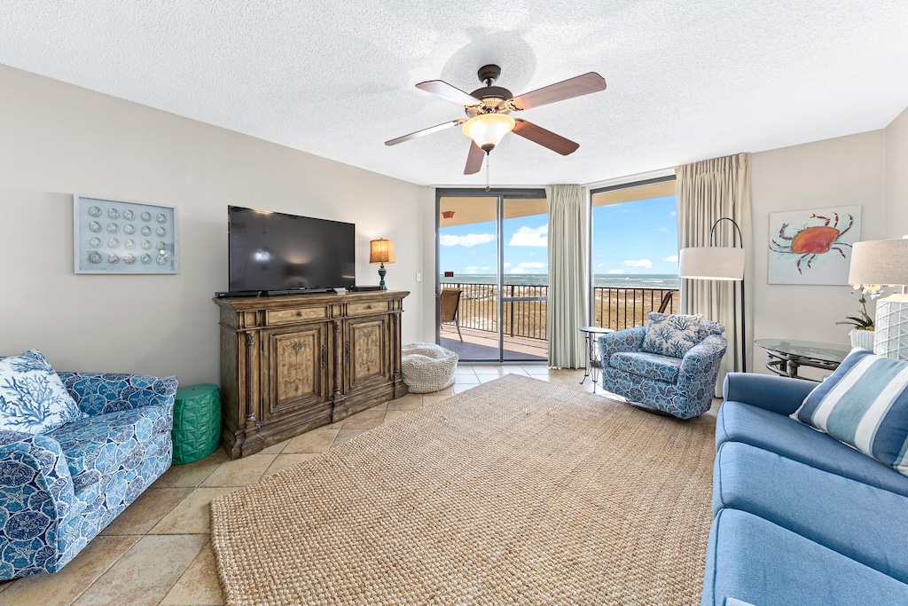 Spacious Living Area offers Queen Size Sleeper Sofa, Access to the Balcony and Fantastic Views