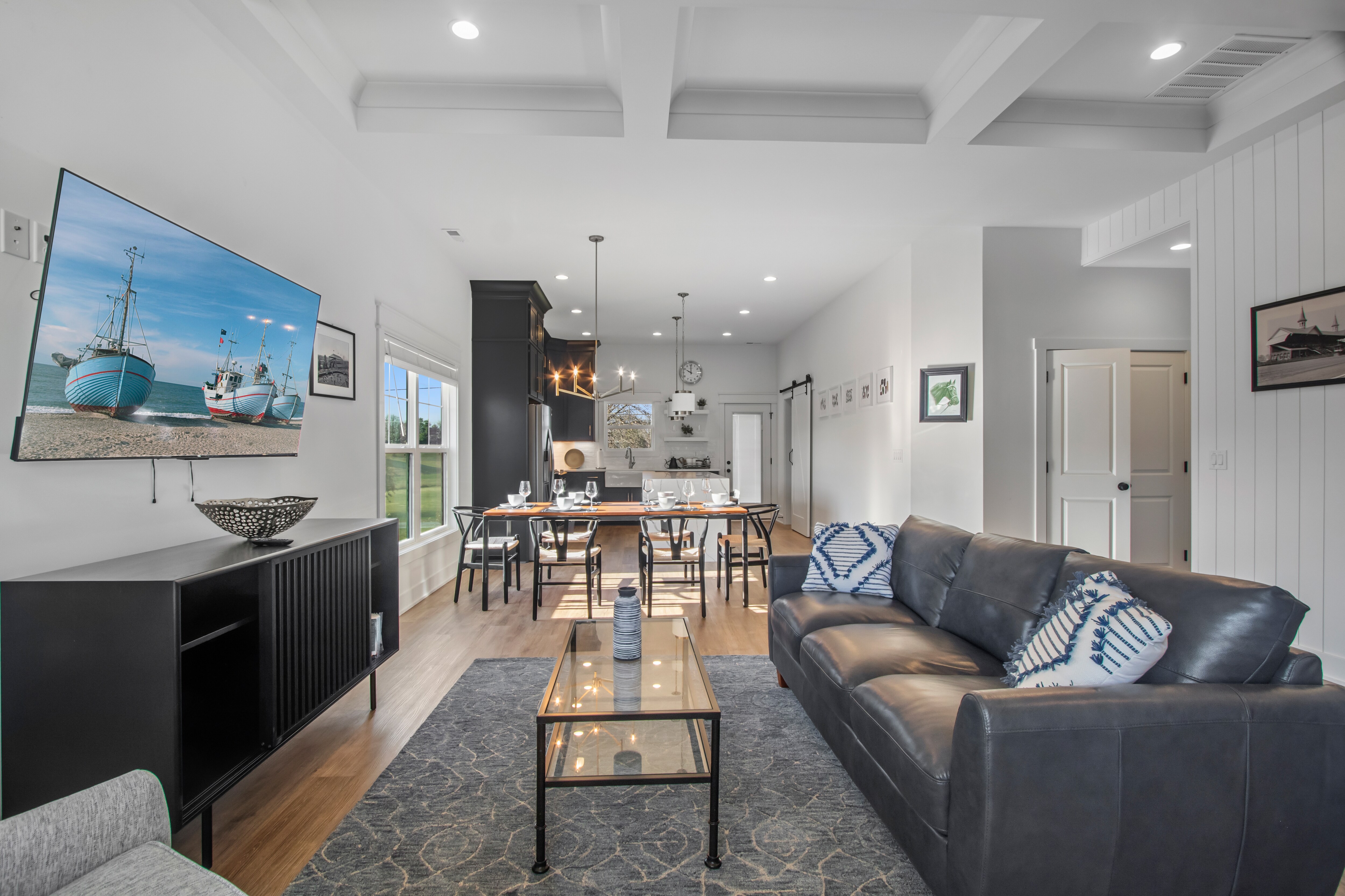 Ideal gathering space provided by a soft sofa & accent chairs