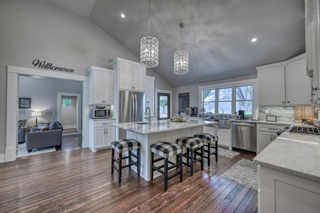 Gorgeous kitchen with center island and stainless steel appliances