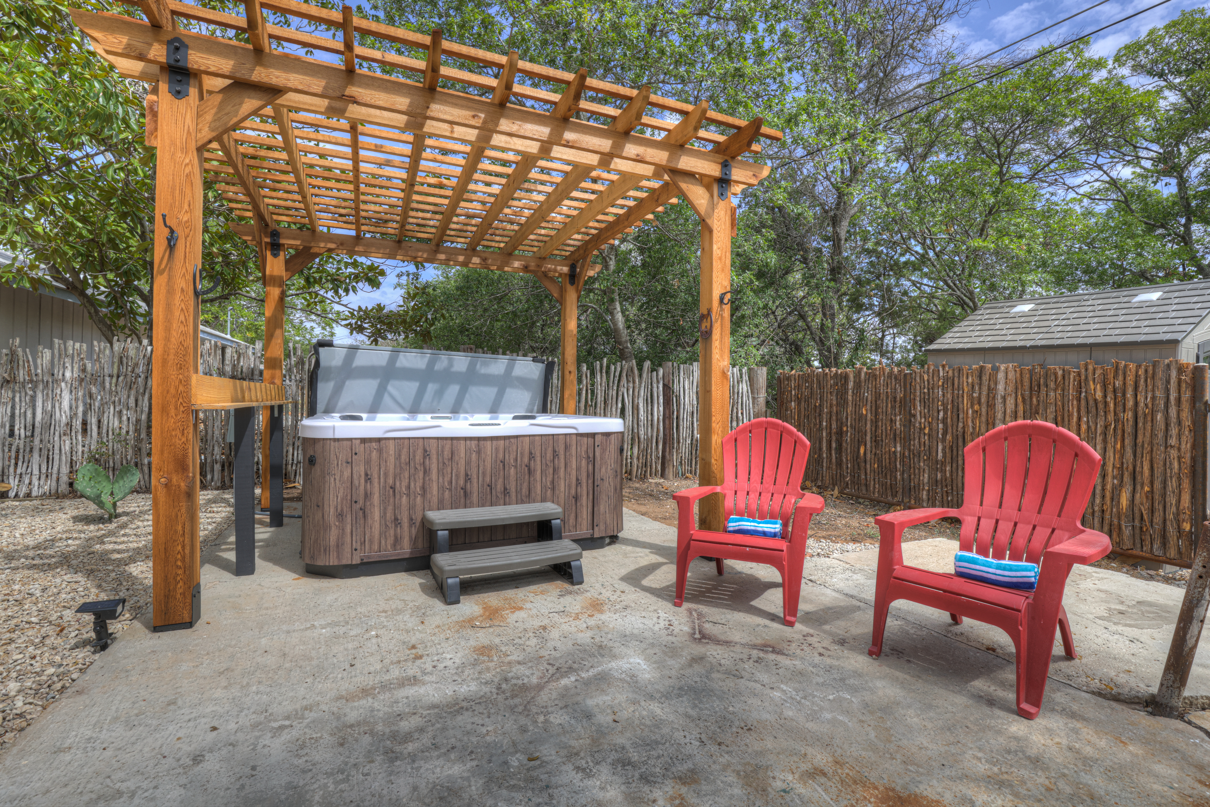 Relax under the stars in a the hot tub with a glass of wine