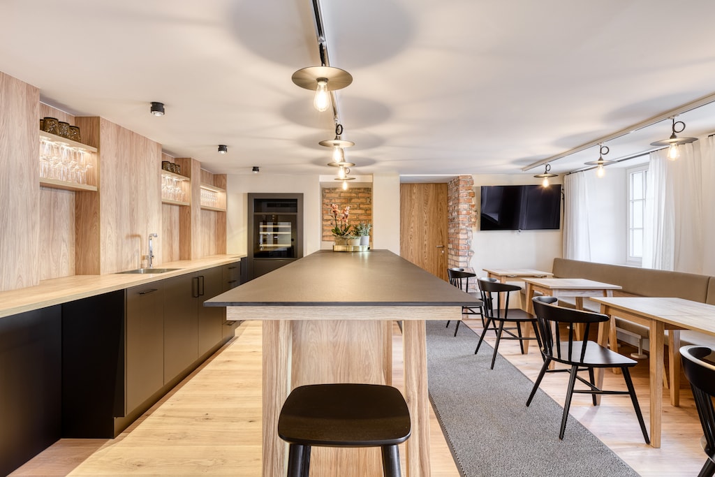 Münsterhaus in Schruns, holiday home, main kitchen with bar, bar & dining area