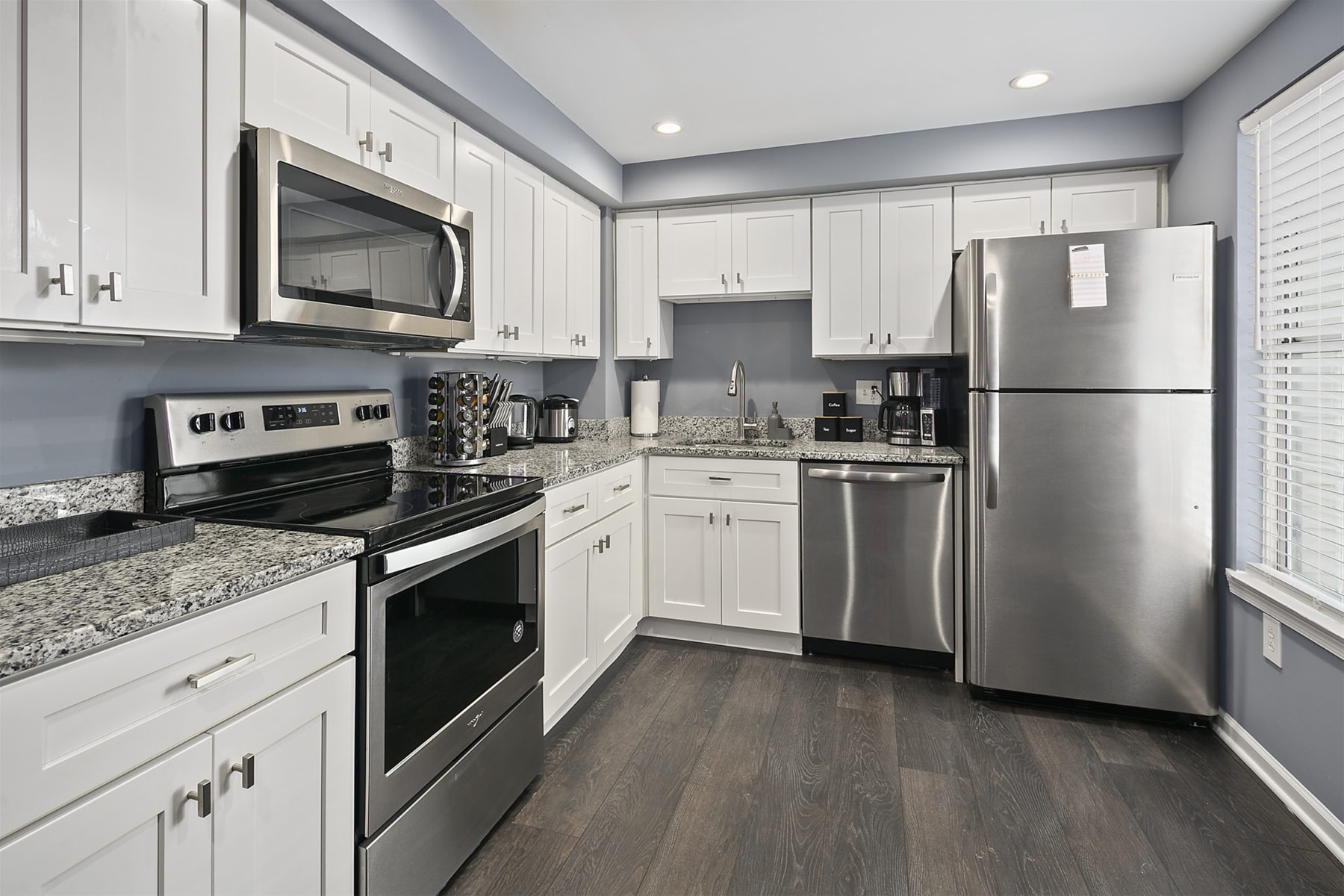 Functional kitchen with an electric range & dishwasher