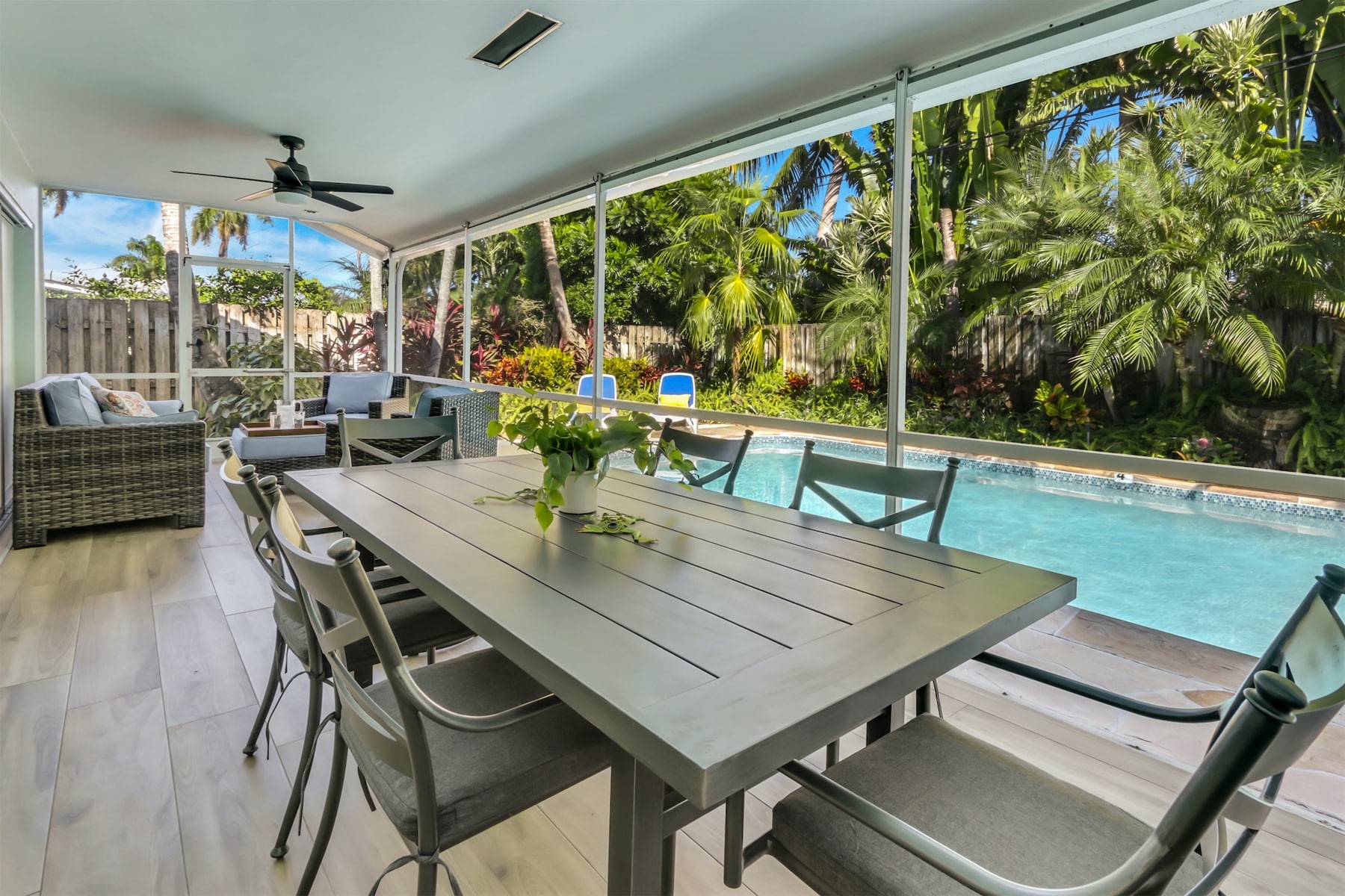 Enclosed Patio | Dining table sits six