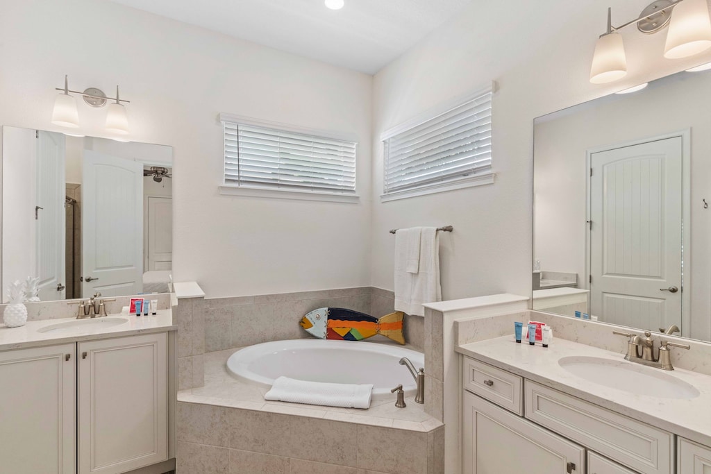 Bathing Bliss: Immerse yourself in elegance with our ensuite bathroom, featuring a decadent bathtub and a modern walk-in shower – the epitome of relaxation.