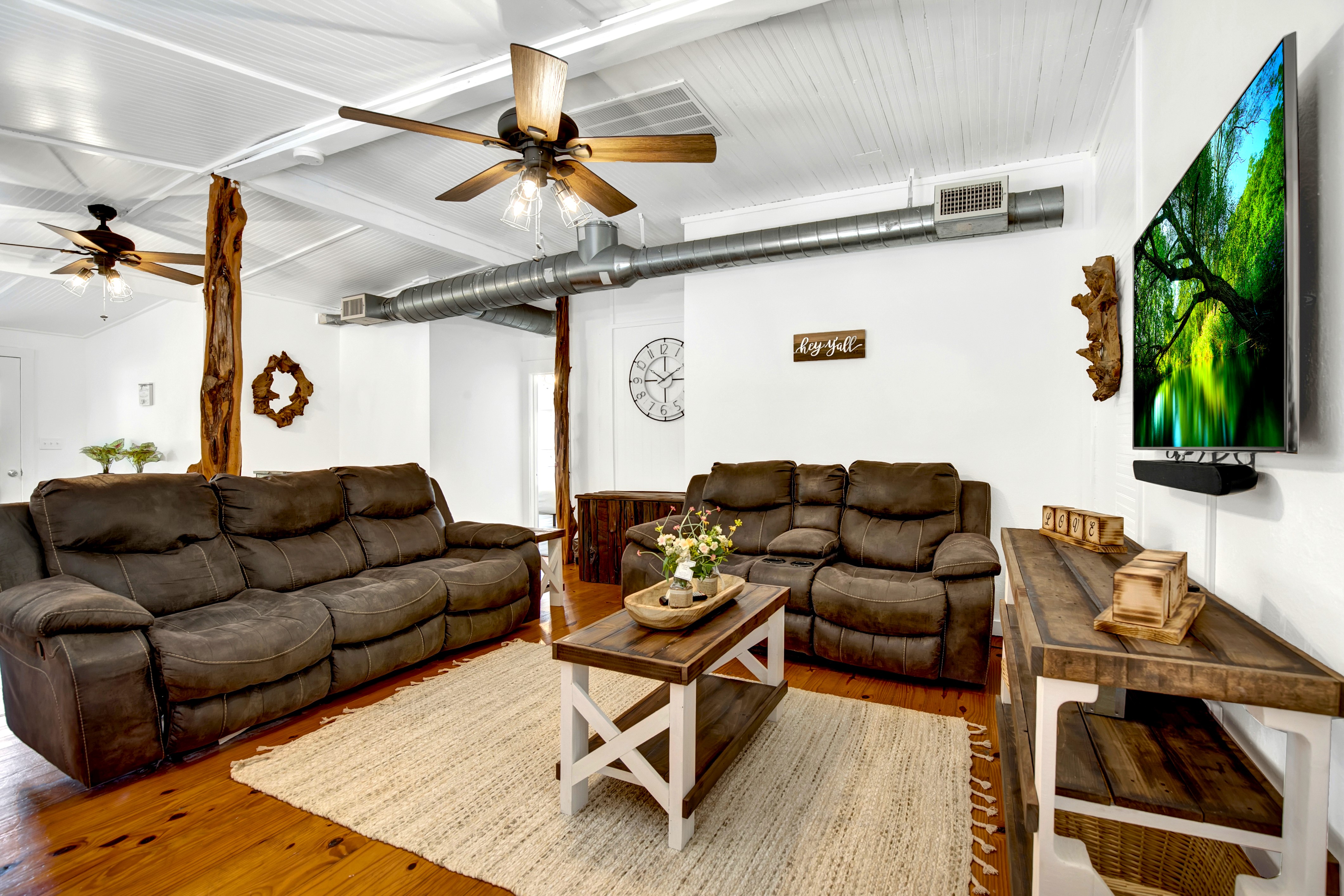 The main living room is spacious and comfortable with plenty of seating for everyone.