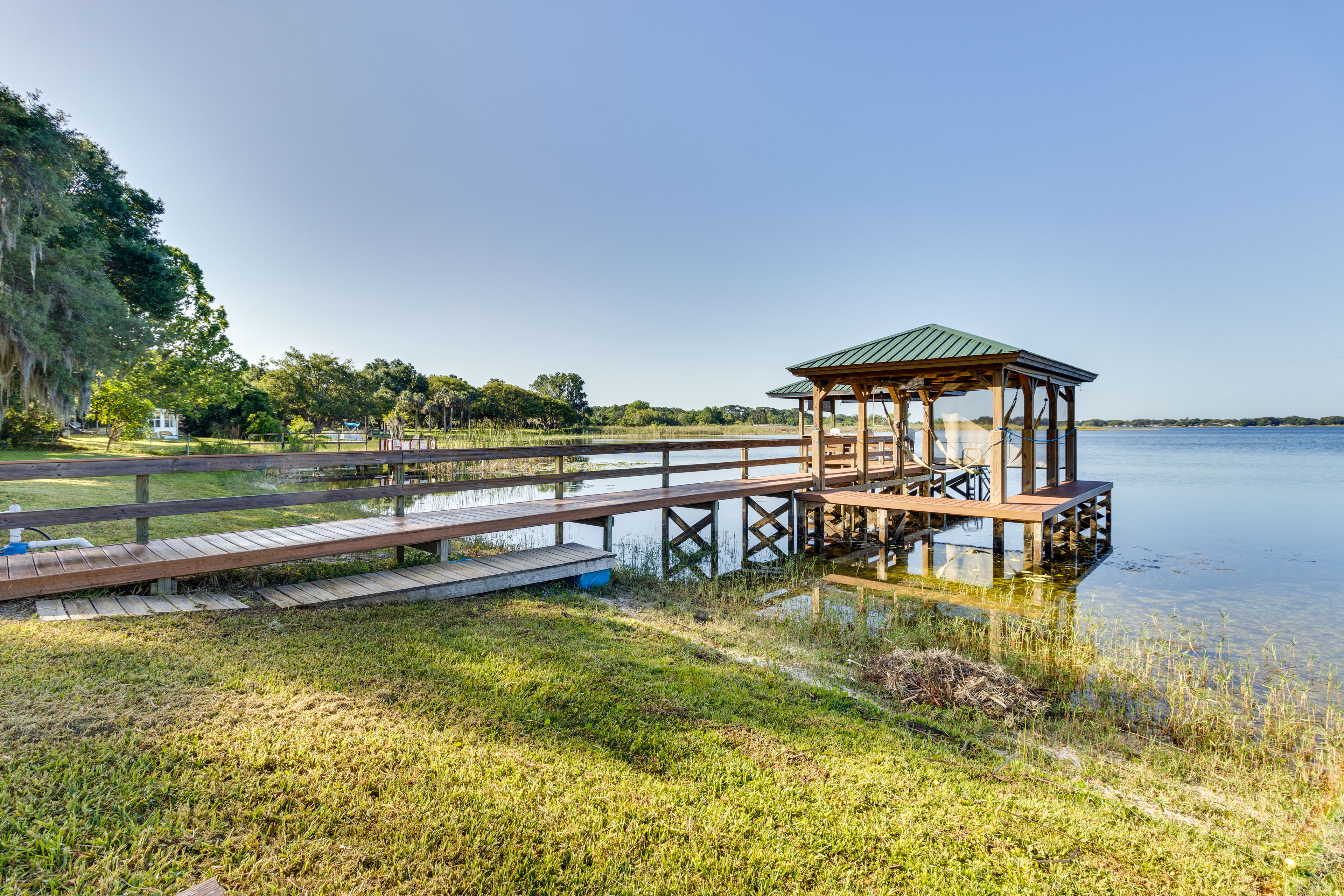 Property Image 1 - Lakefront Tavares Home w/ Deck, Patio & Dock!