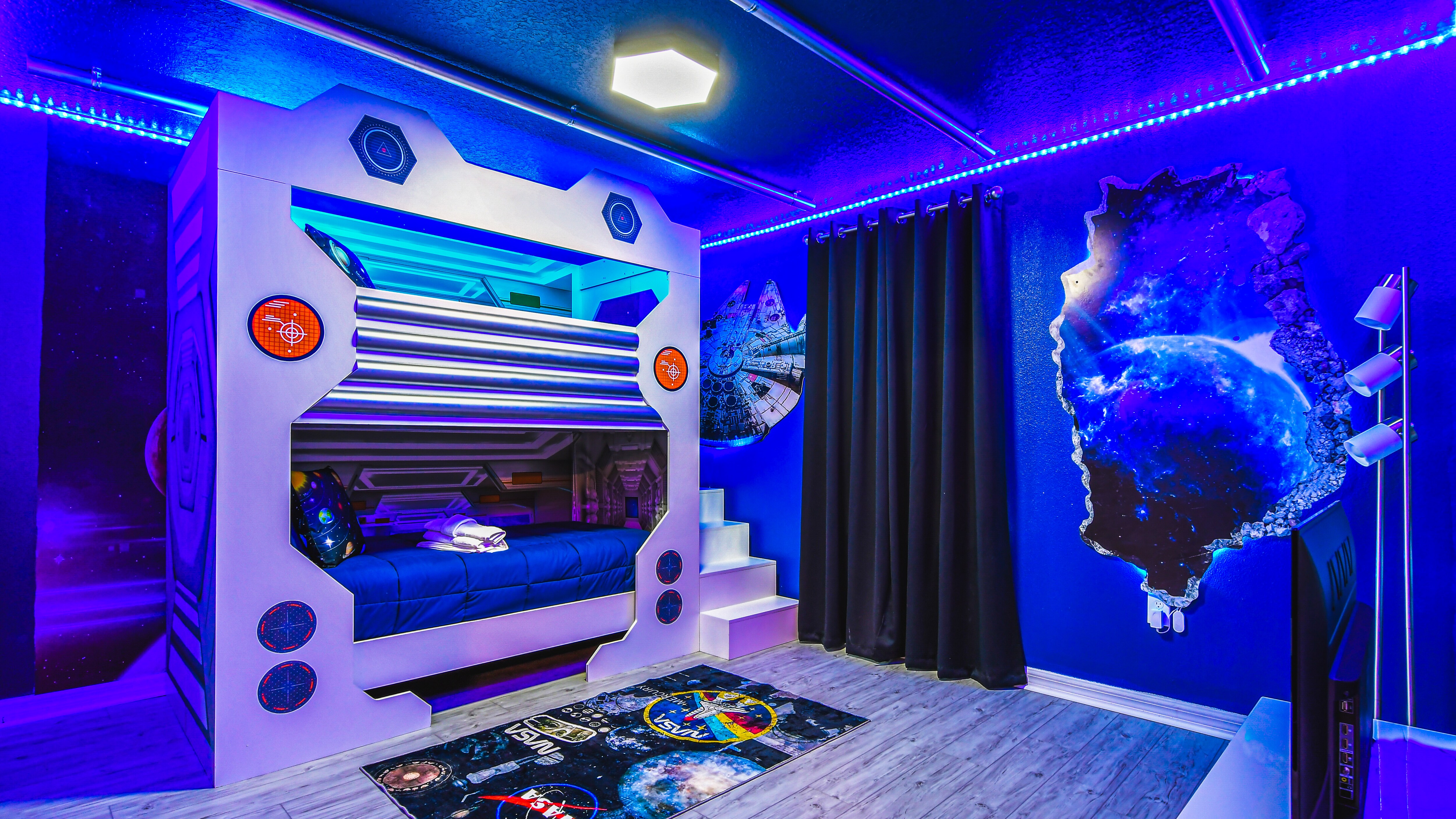 Kids will love the upstairs bedroom with a cool Star Wars theme