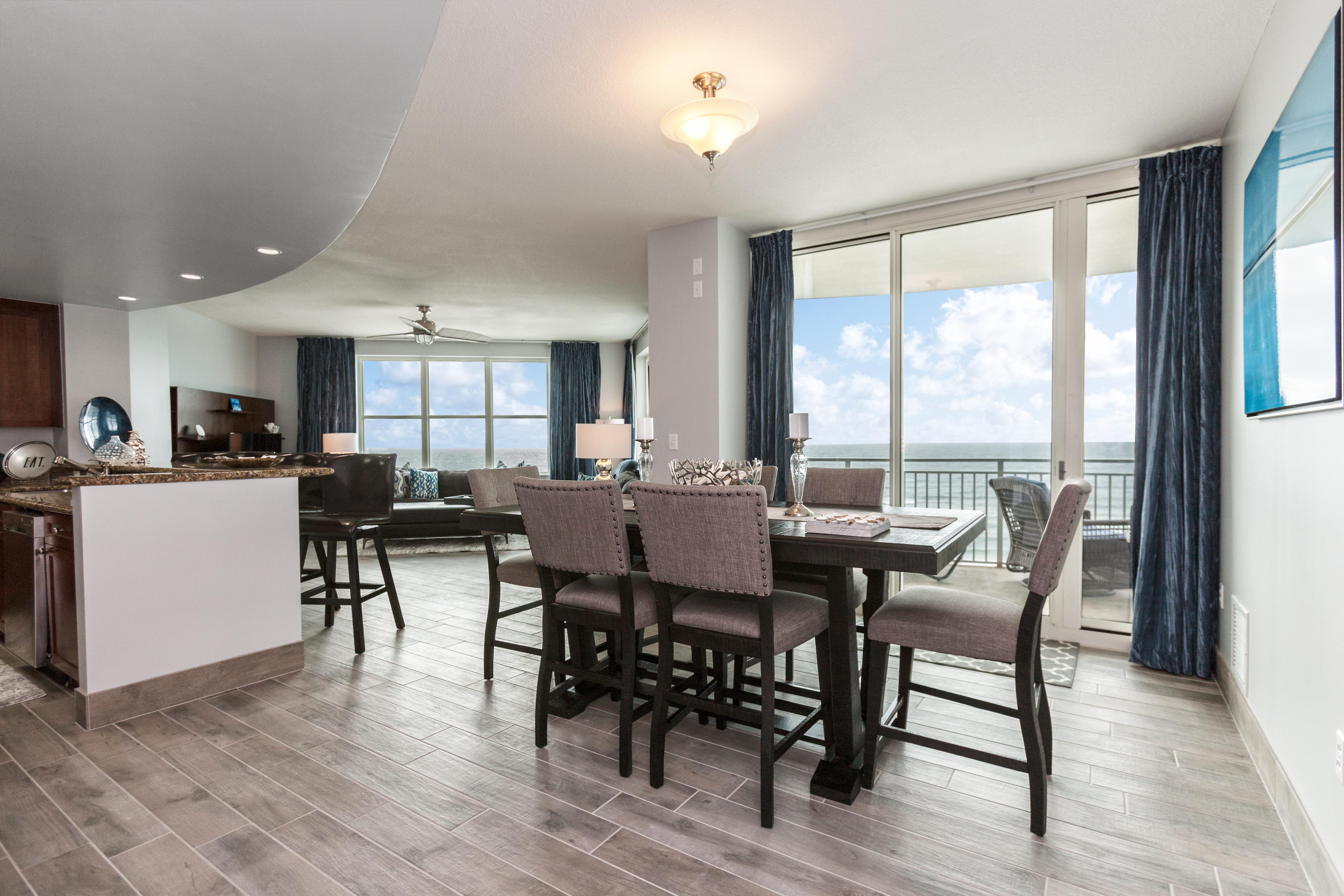 Spacious Living, Kitchen and Dining area with panoramic views of the Gulf Coast! 