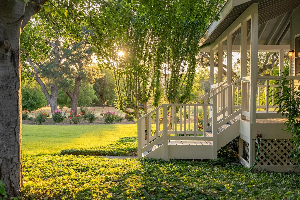 South side of the home at sunset, side entrance to the wrap-arou