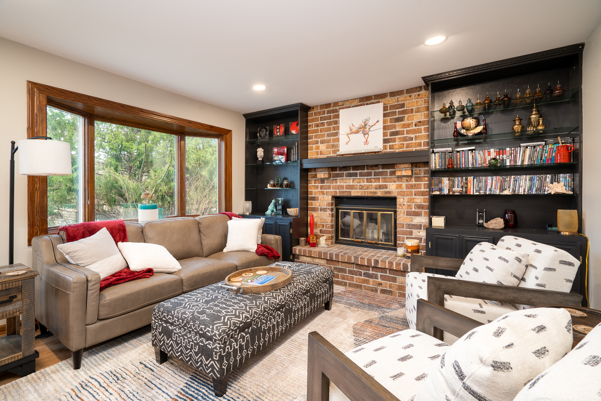 Cozy Lower level family room (Fireplace decor only)