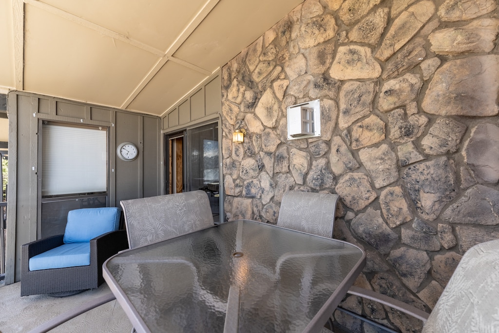 Private balcony with outdoor seating and breath taking mountain, lake and amphitheater views. 