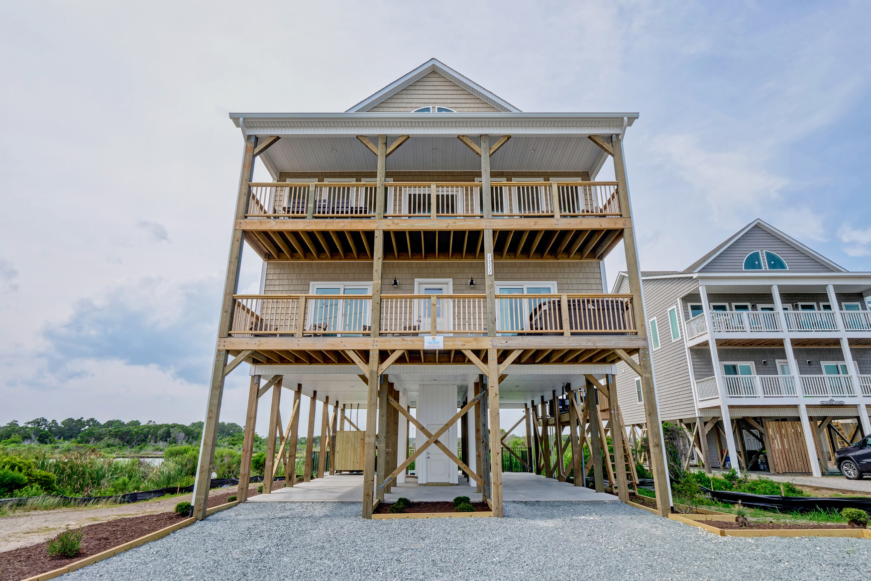 Impressive home across from the ocean; street view