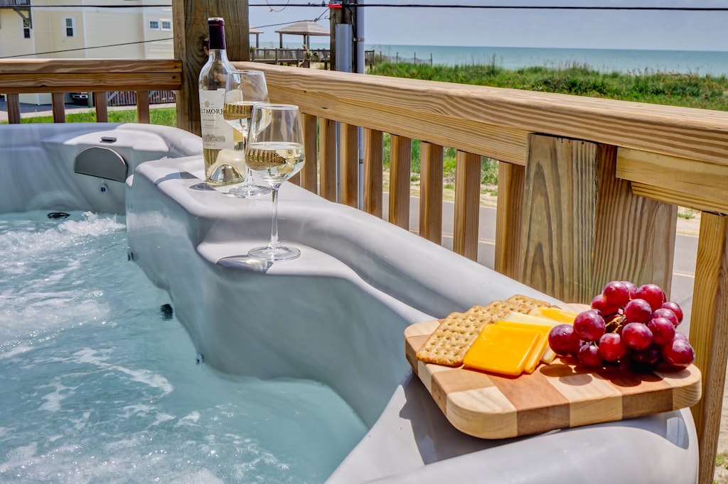 Unwind after a day on the beach in this private hot tub