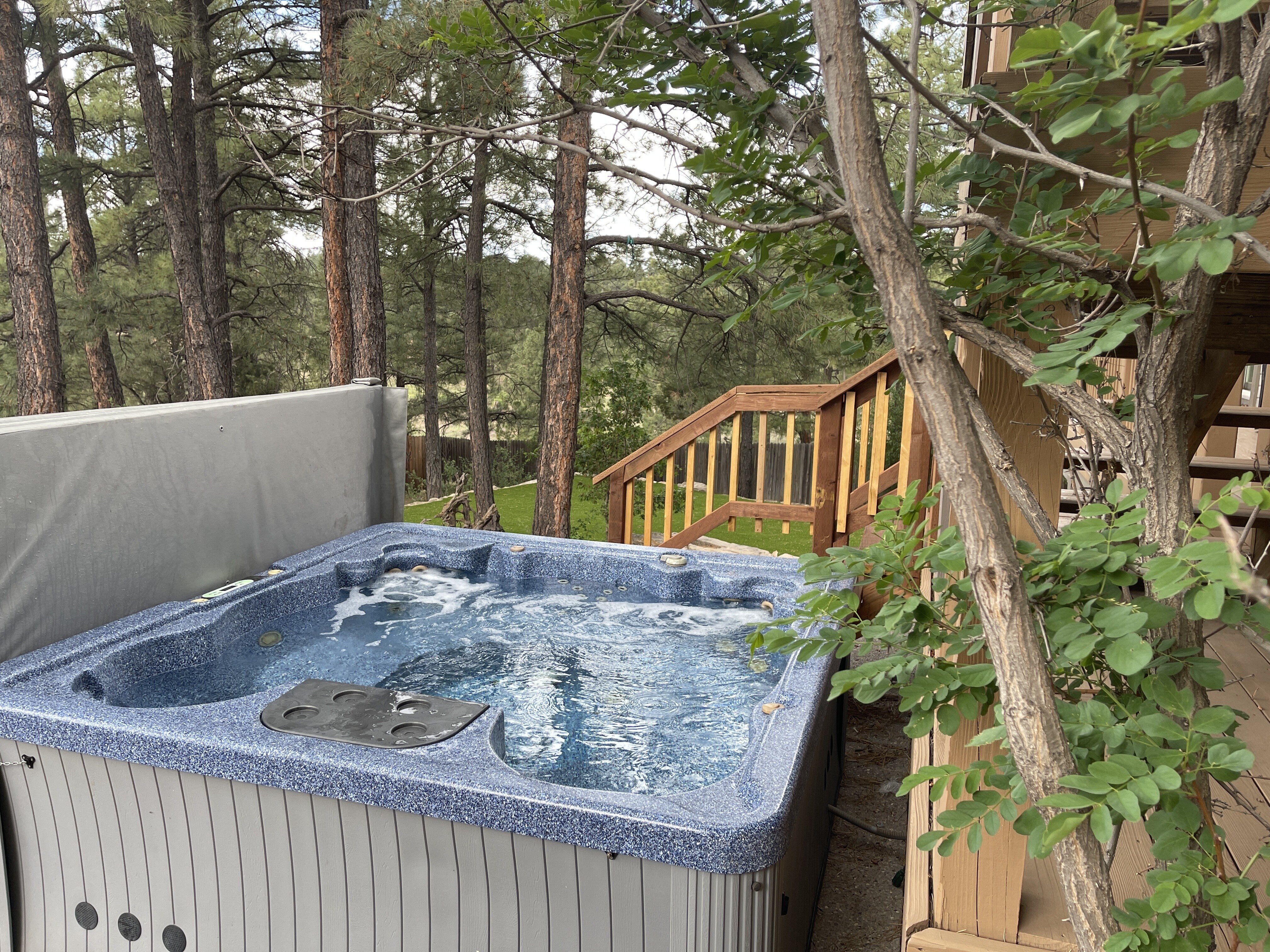 Relax in the pines while enjoying this beautiful hot tub. This is the way to relax! Relax in the pines while enjoying this beautiful hot tub. This is the way to relax!