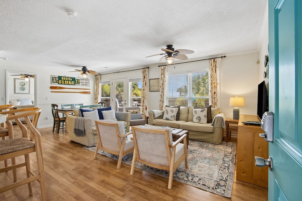 Entryway view of Living Room and Dining Area