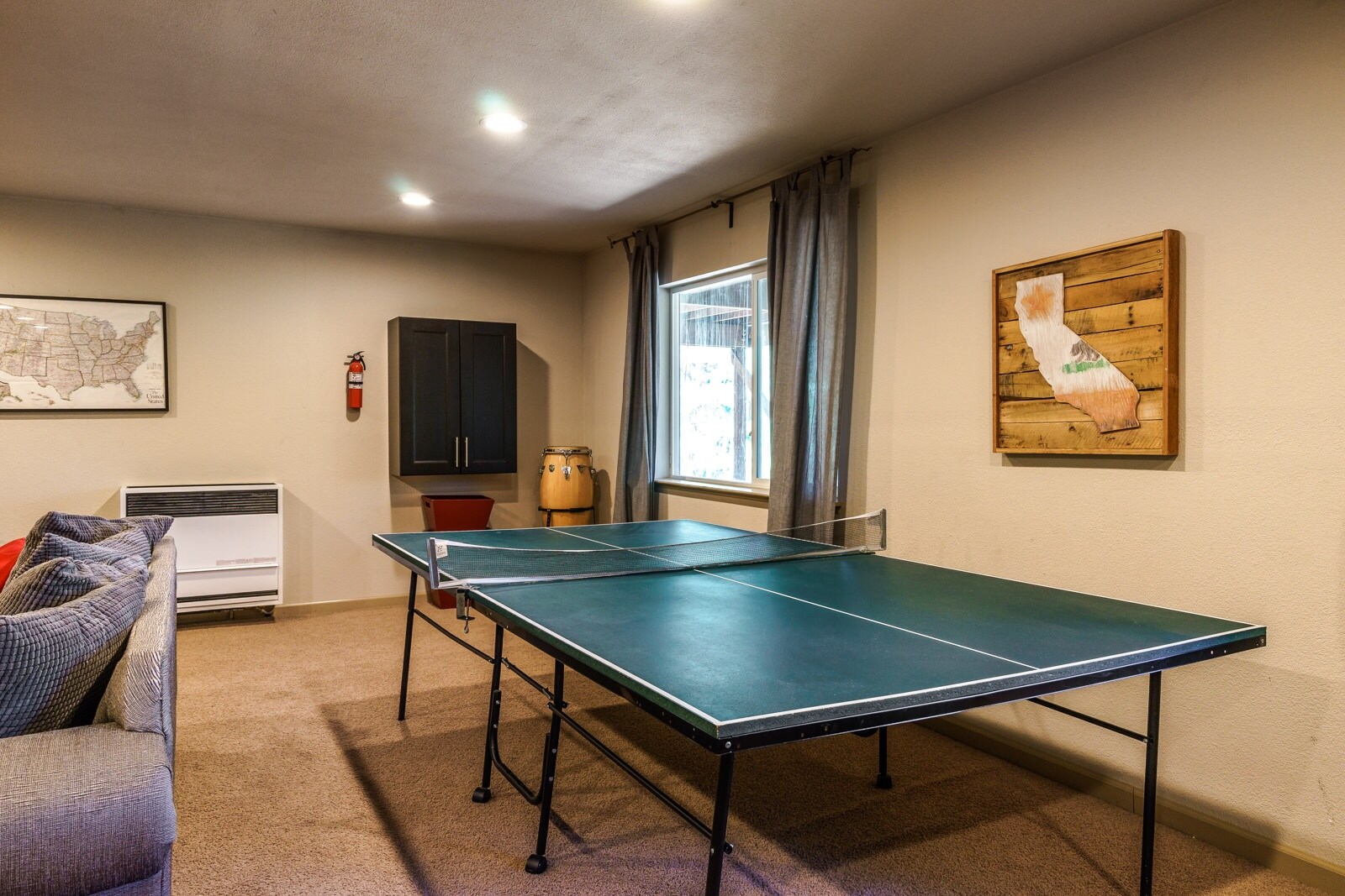 Ping Pong in bonus room on lower level. Unit 8 Lot 15, Pine Mountain Lake Vacation Rental, Hillside Haven.