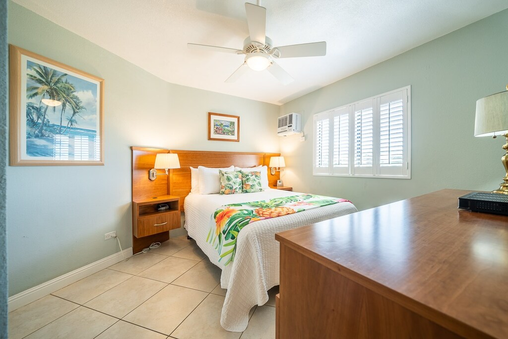 Tile flooring in the bedroom is fresh and bright.