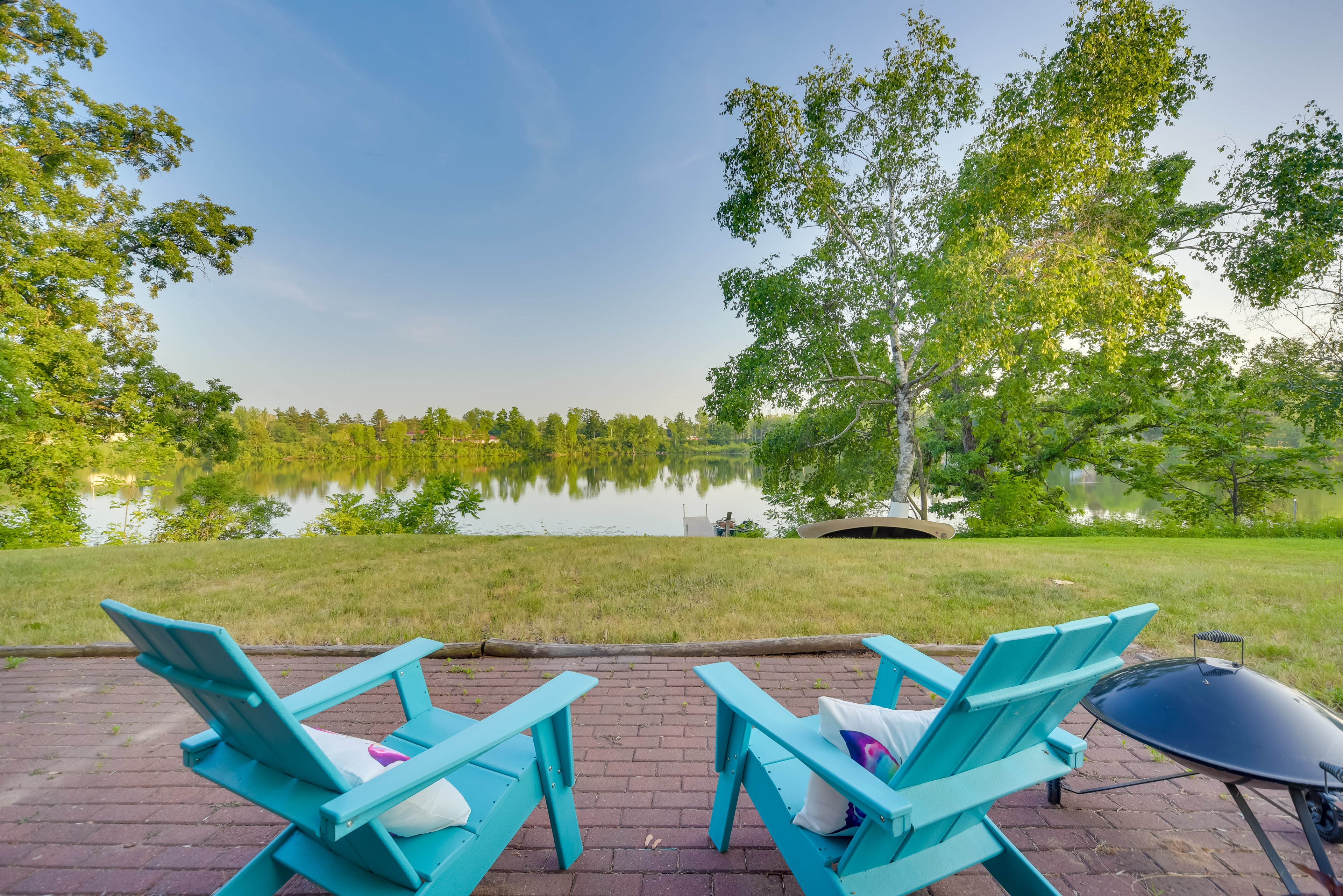 Property Image 2 - Lakefront Birchwood House w/ Deck + Fire Pit!