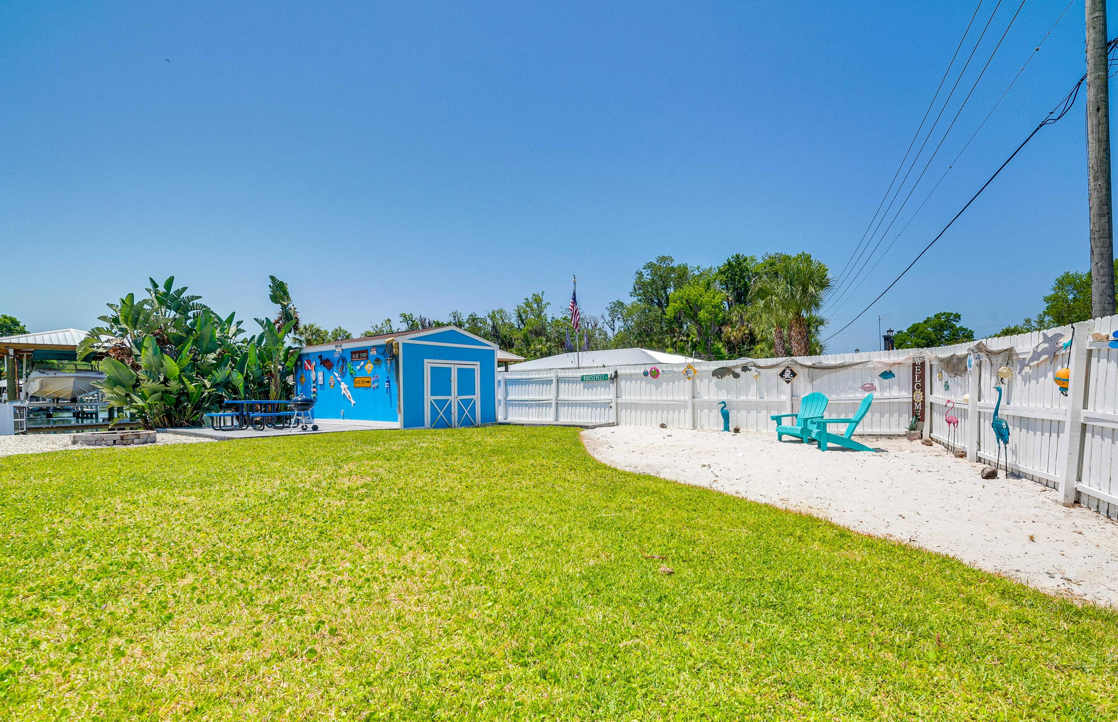 Property Image 2 - Colorful Canalfront Home - Boat Dock, Deck, Kayaks