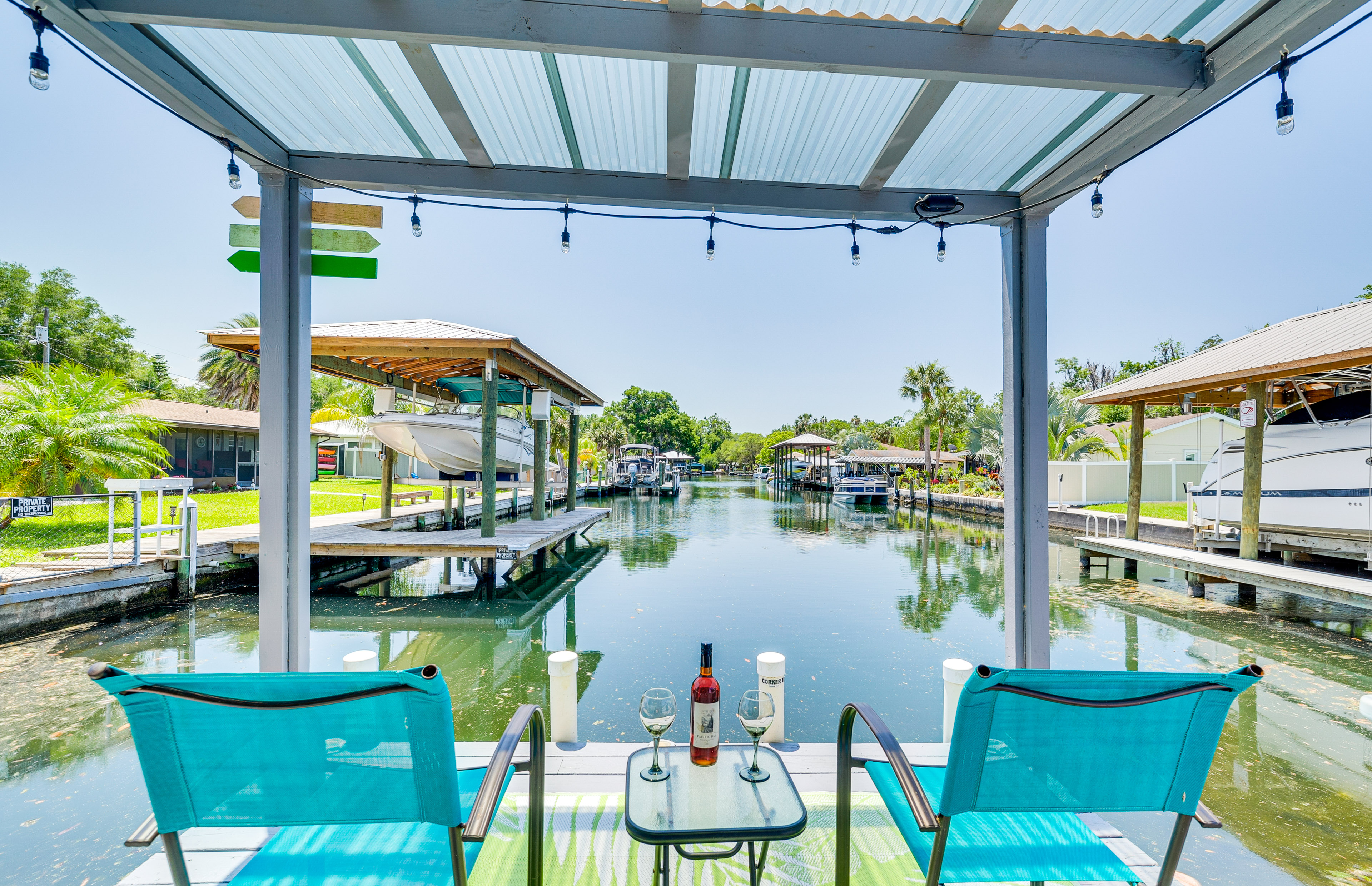 Property Image 1 - Colorful Canalfront Home - Boat Dock, Deck, Kayaks