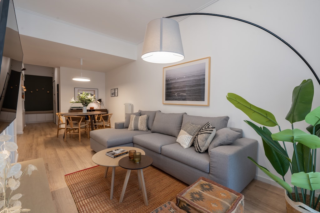 Tastefully furnished with a keen eye on detail, the living room sports a comfortable corner sofa 