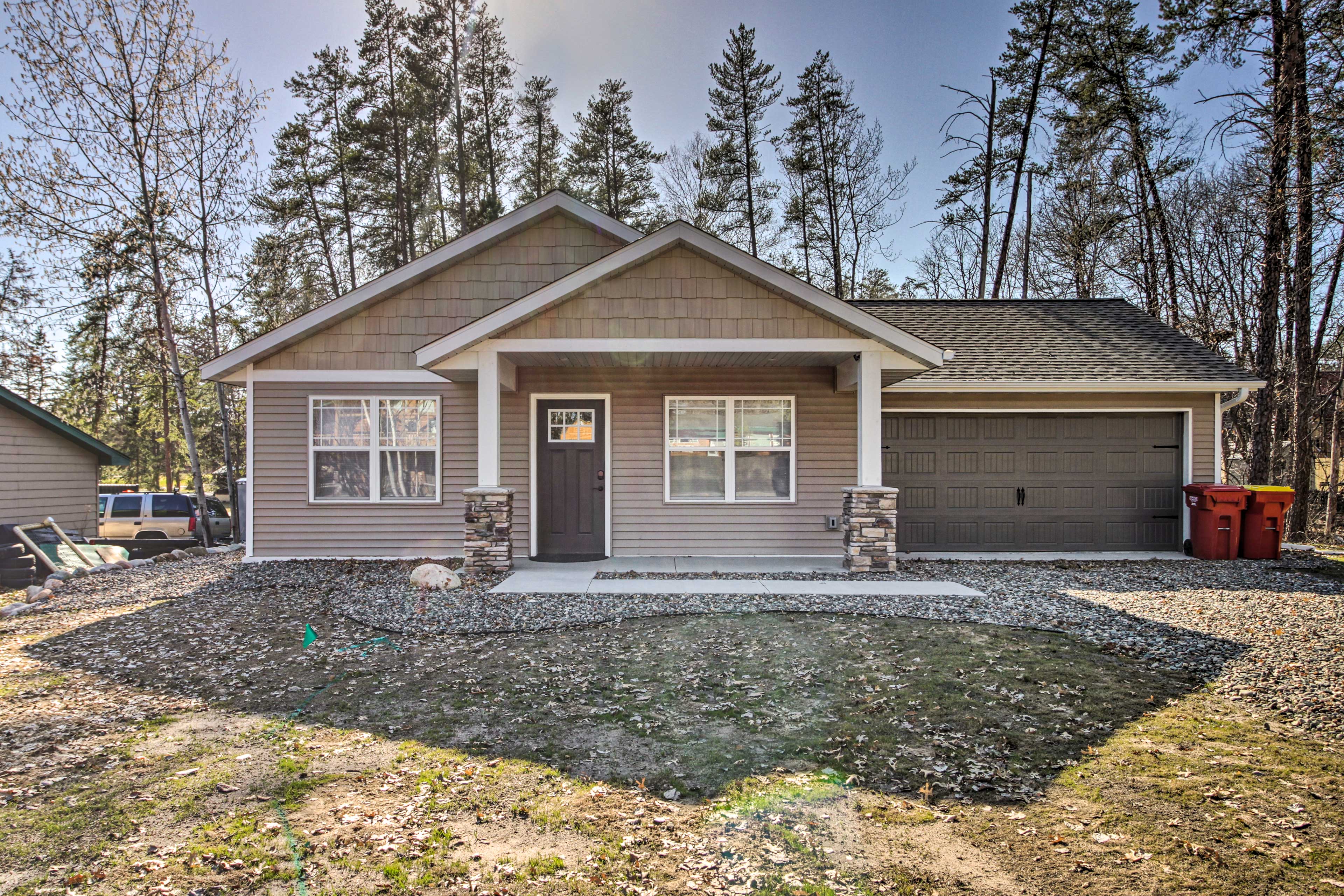 Property Image 1 - Breezy Point Cabin w/ Fire Pit - Walk to Lake