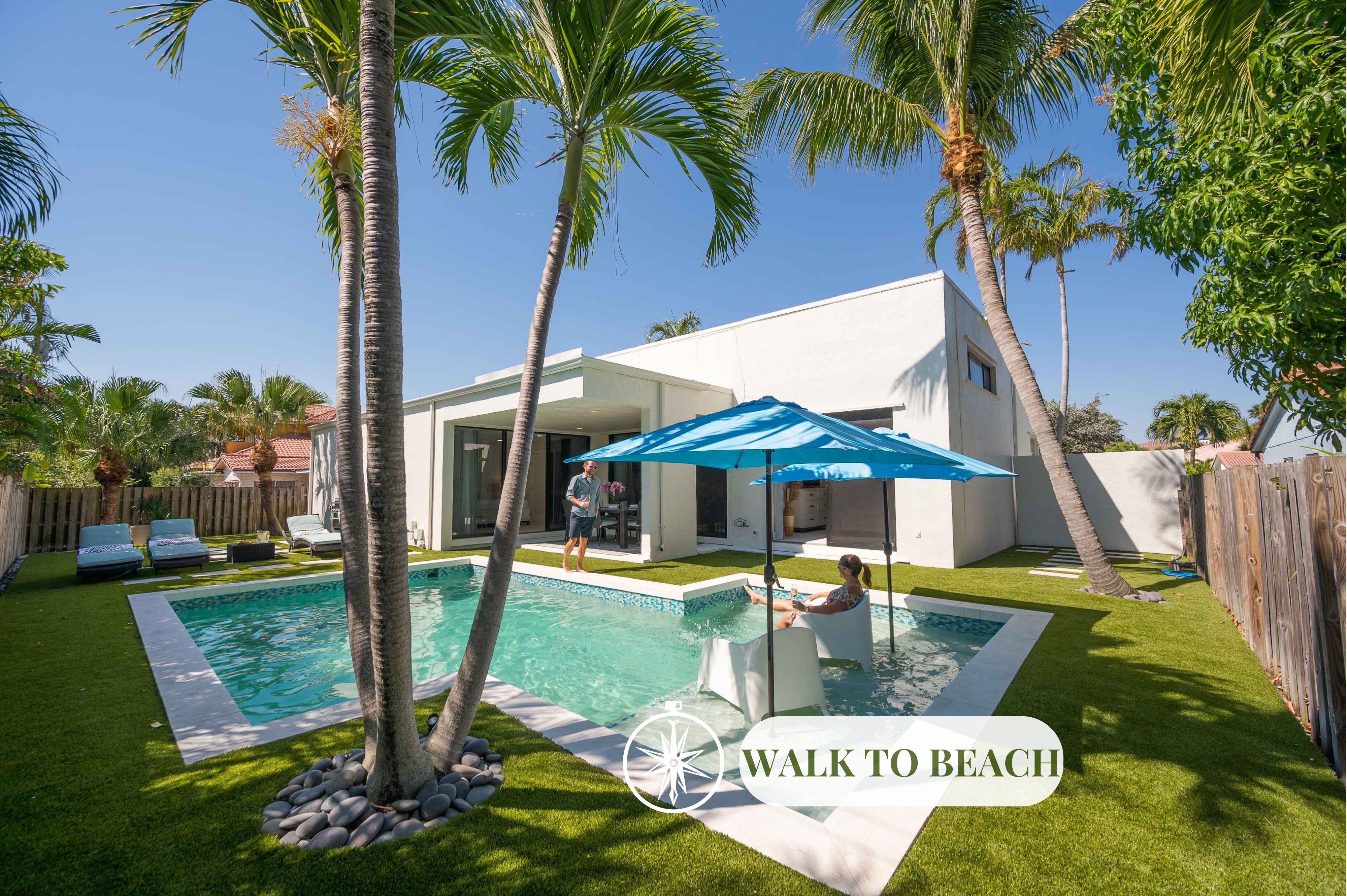 Located just a five min walk from the beach, this cozy modern coastal residence is an open concept modern delight.