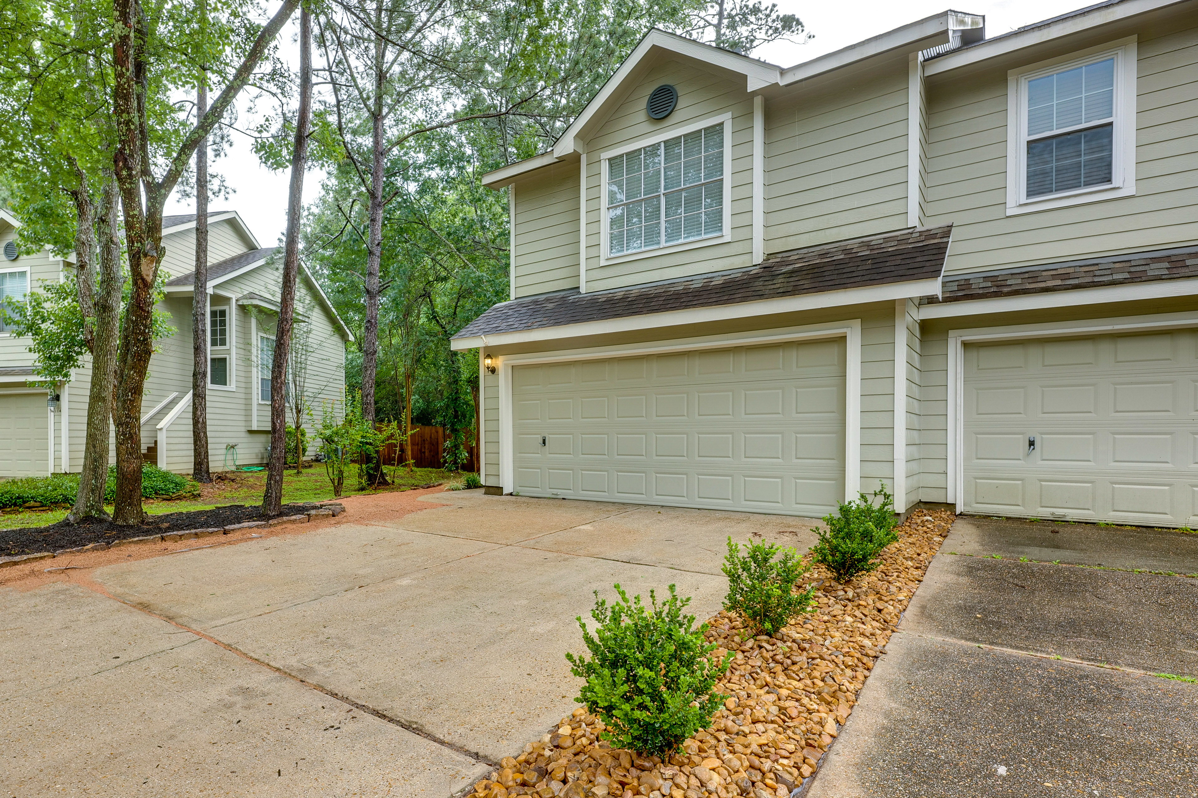 Property Image 1 - Modern Woodlands Townhome w/ Spacious Yard & Patio