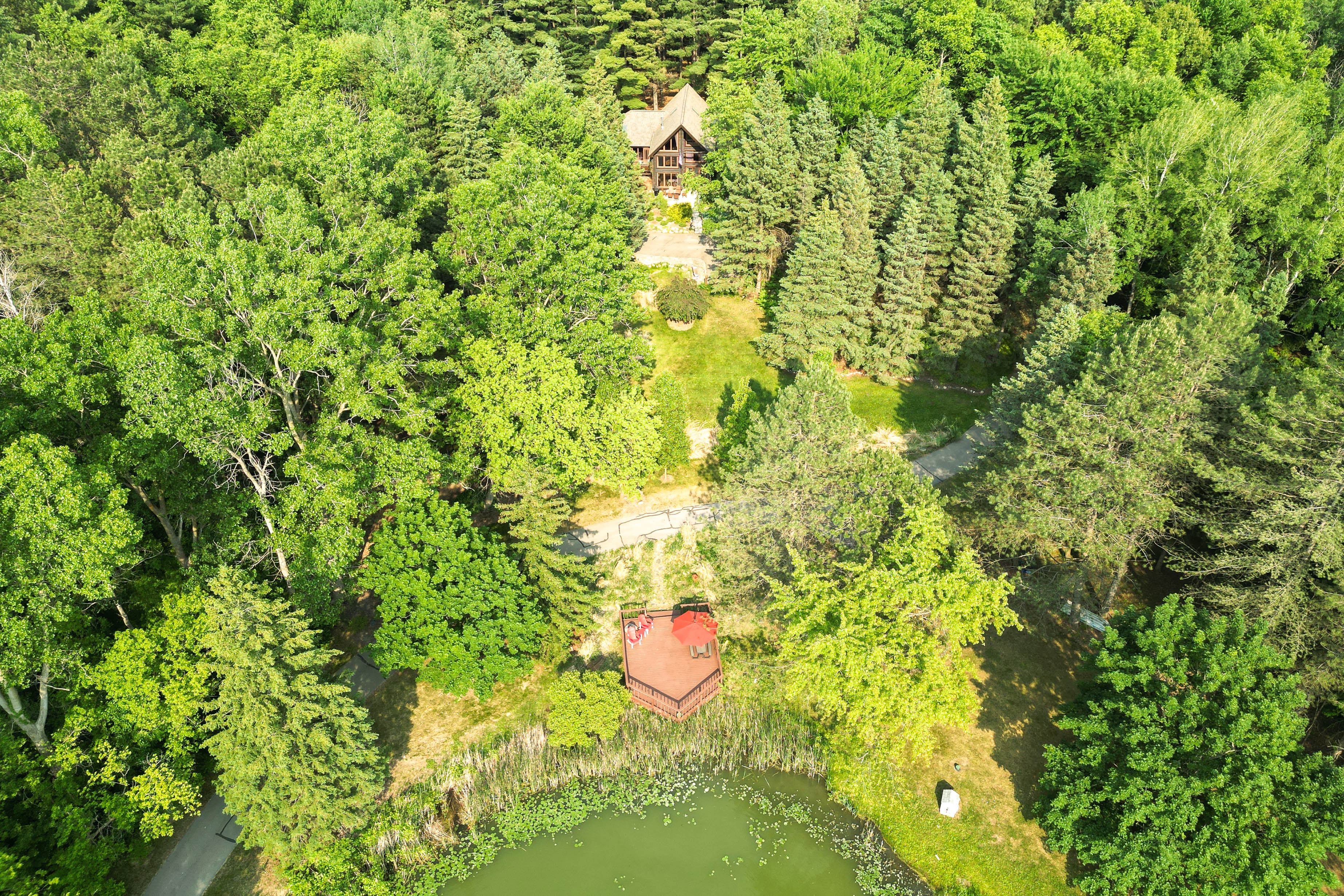 Property Image 2 - Magical Metamora Cottage w/ Fire Pit, Pond, Deck!