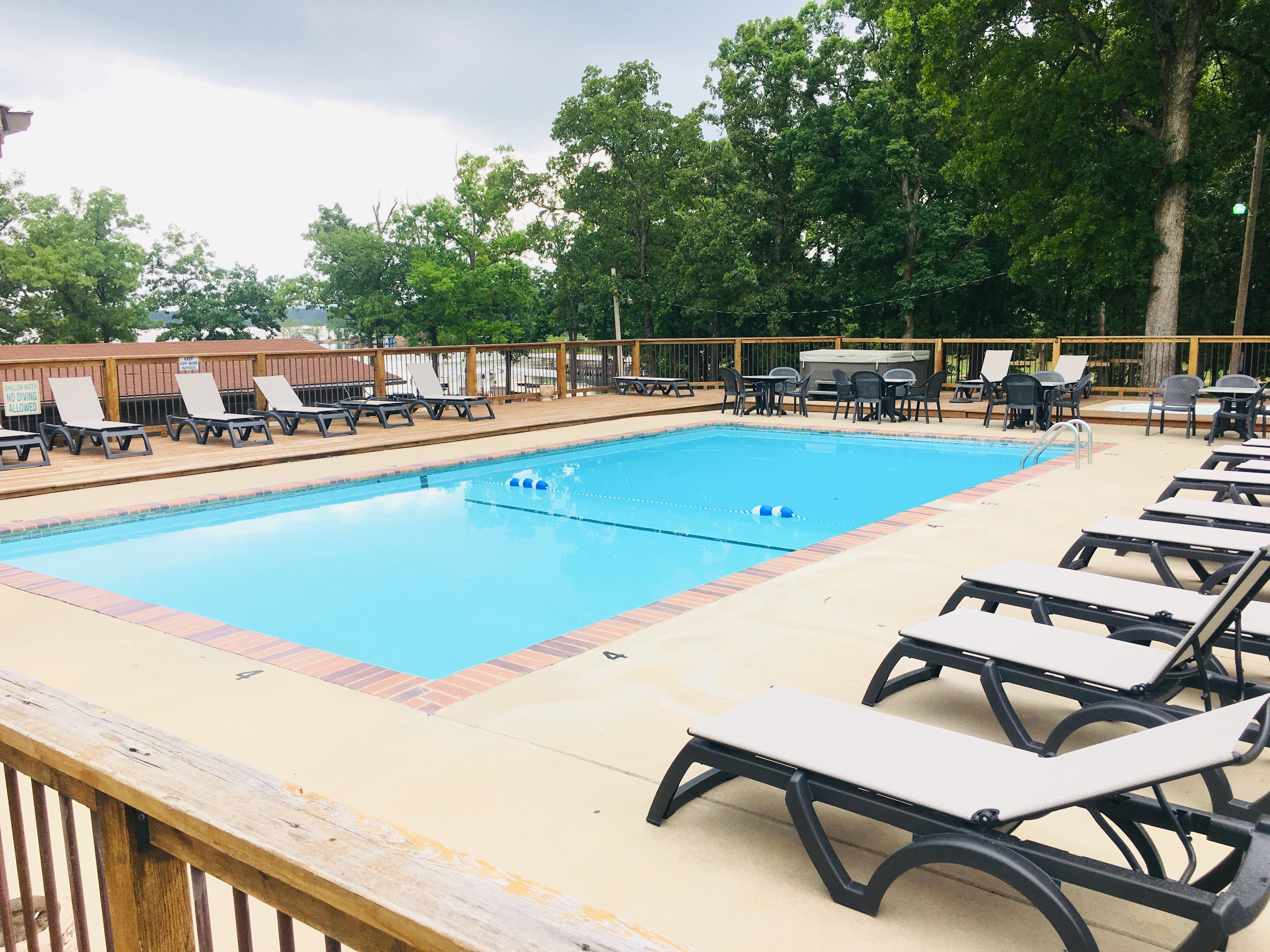 Waterfront Pool, Hot Tub & Kiddie Pool next door to the Game Room, Shuffleboard, and Grand Fire Pit