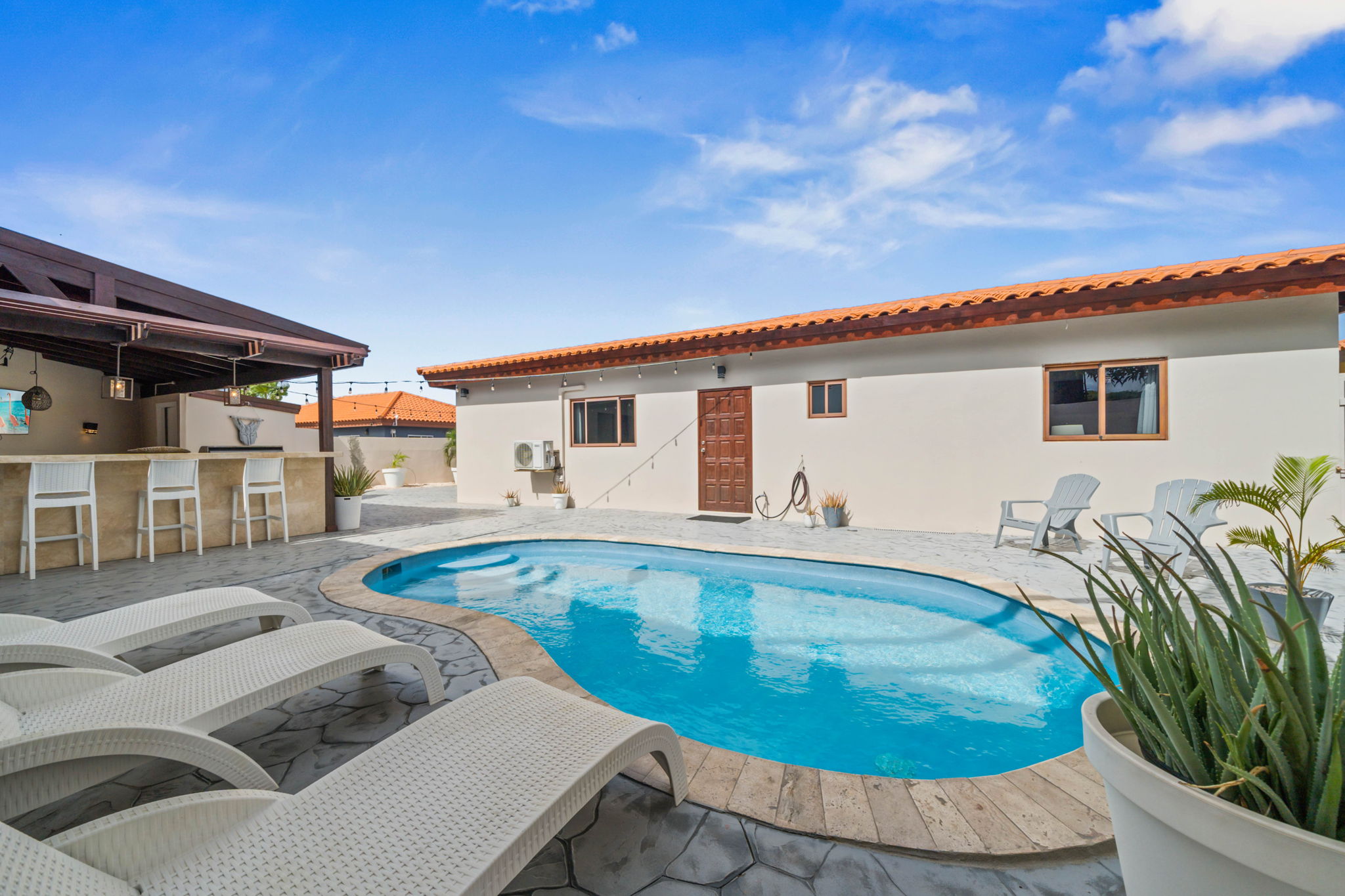 Private pool and outdoor kitchen- enjoy the outdoors even more! swim, dine out and relax.