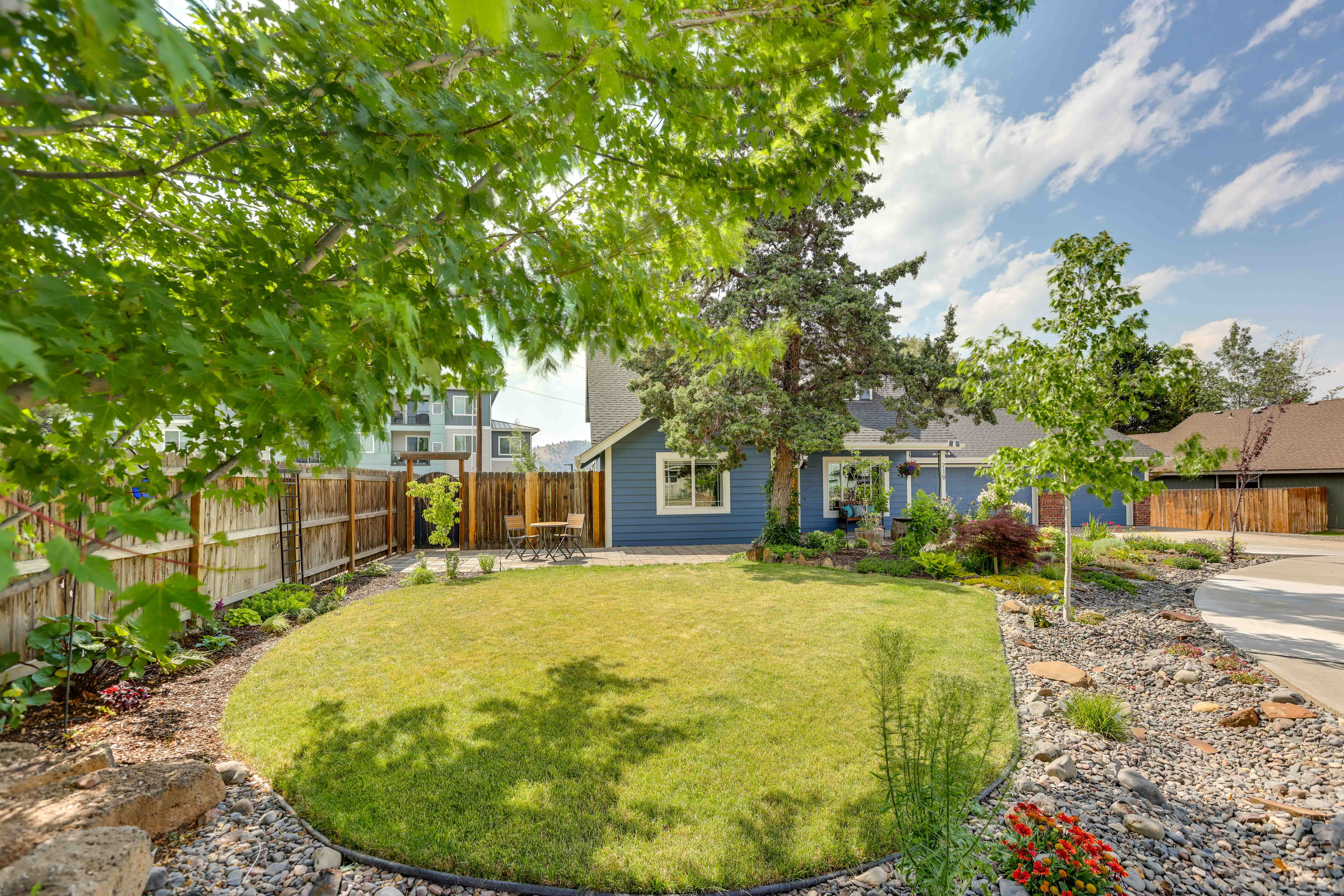 Property Image 1 - Colorful Bend Home w/ Yard & Fire Pit!