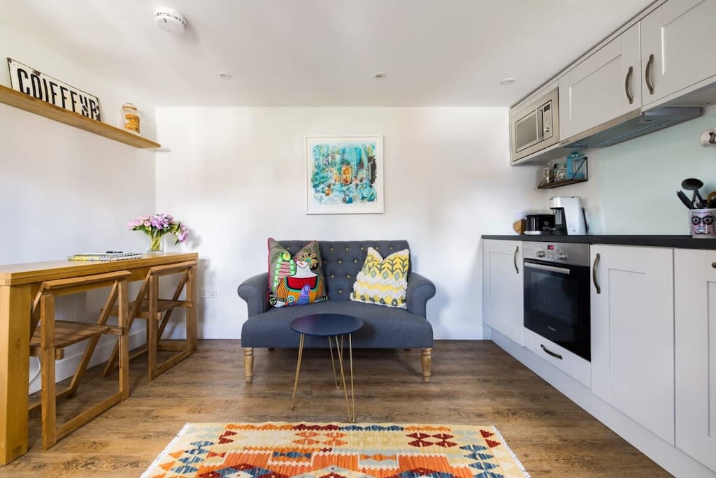 Lavendar Folly cozy compact kitchen/living space