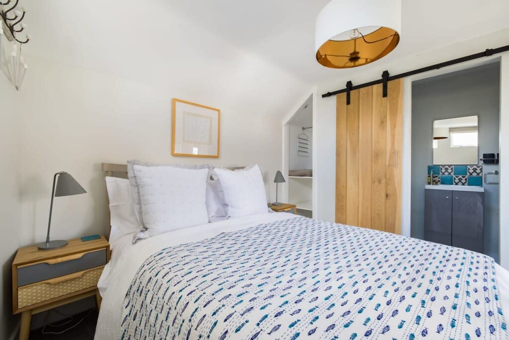 Lavendar Folly bedroom with a built-in vanity area