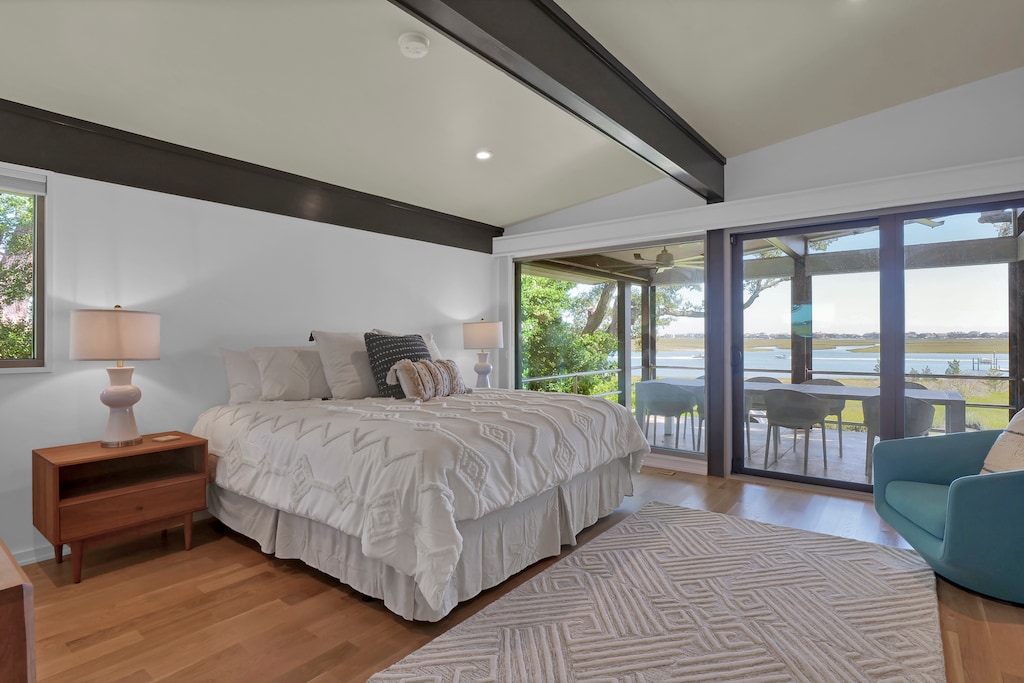 King bedroom with deck access and breathtaking views
