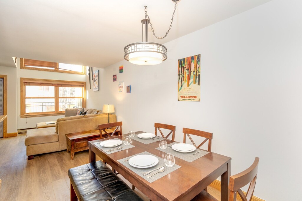 The combined dining, kitchen and living room offers ample space for guests as well as dining for 6.