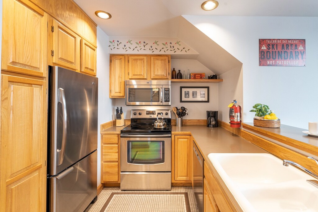 The kitchen has stainless appliances and is well equipped with everything for your stay!