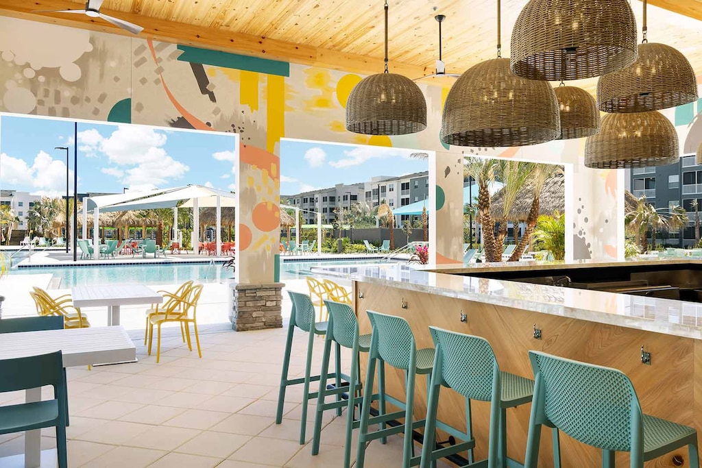 The perfect spot to fuel up and cool down, sit under the shade at the Aqua Bar & Grille and enjoy family-friendly bites, refreshing drinks and laid-back vibes