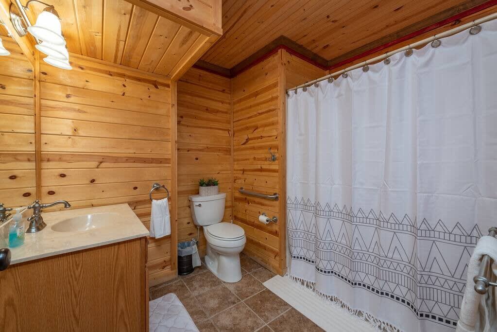 Full bathroom with tub shower