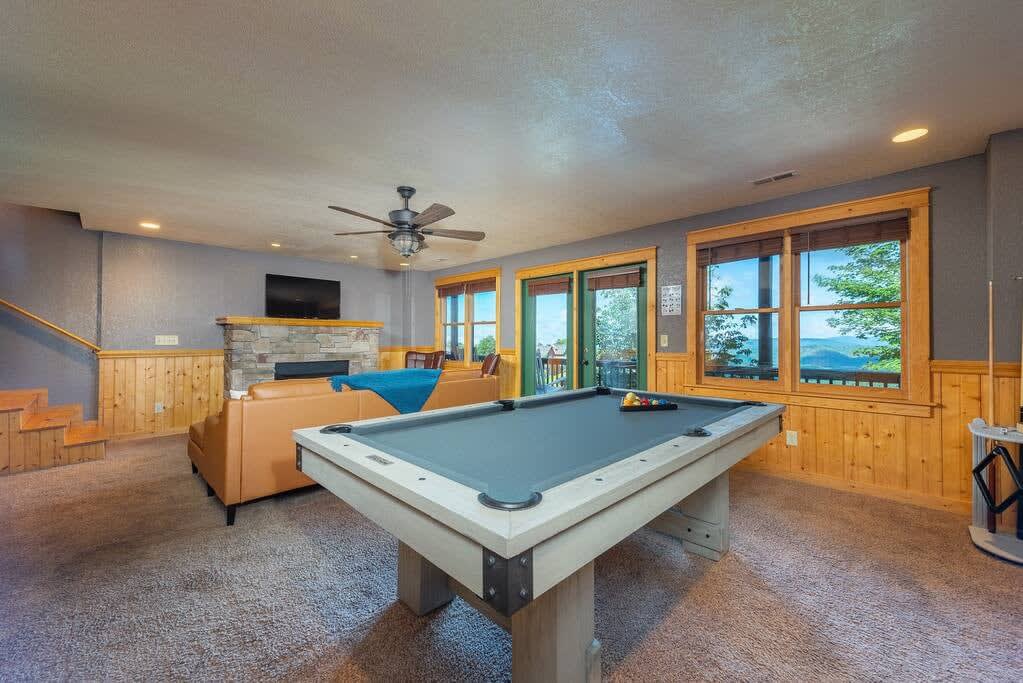 TV and game room with pool table