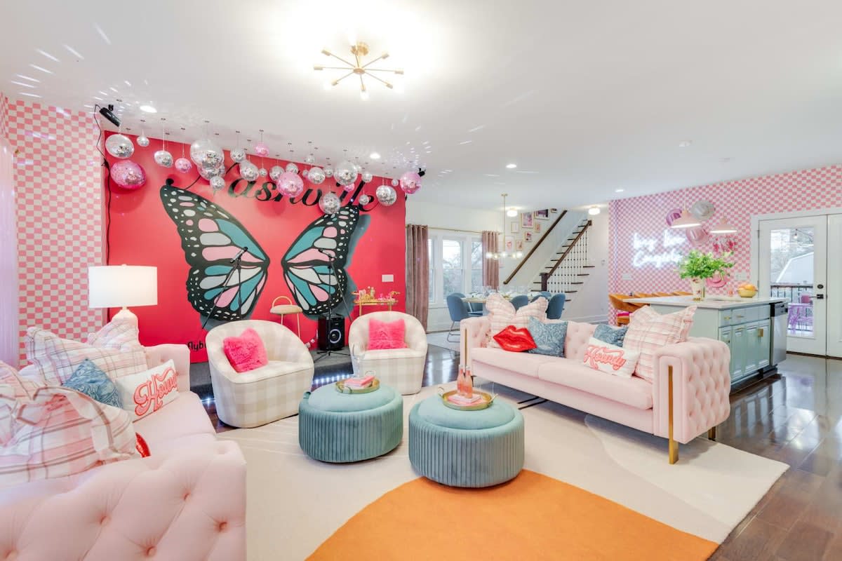 Large living room, custom butterfly mural with karaoke stage with microphone and speakers