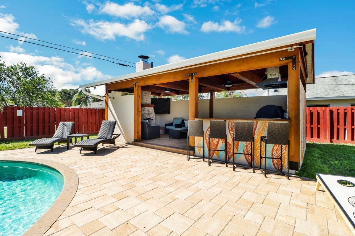 Our beautiful 3 bedroom home has a private in ground pool with this wonderful full outdoor kitchen, wet bar, seating area with fireplace and Smart TV for your enjoyment. You won't want to leave.